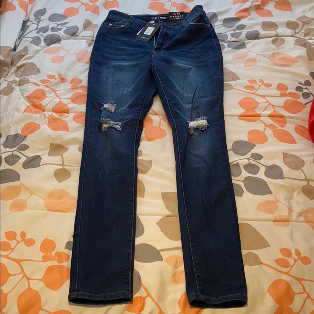 Dark high waisted ripped jeans